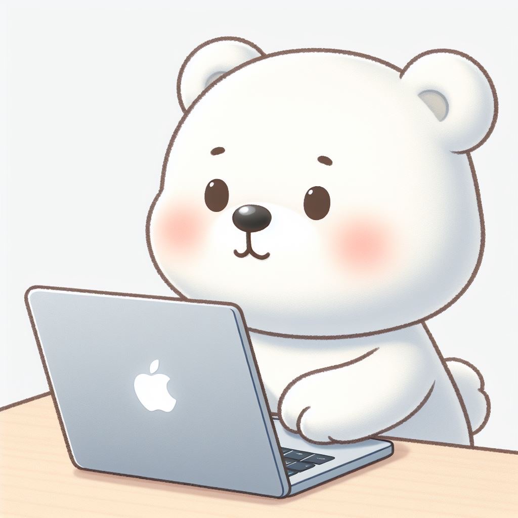 白熊が卓上のマックブックを操作しているイラスト